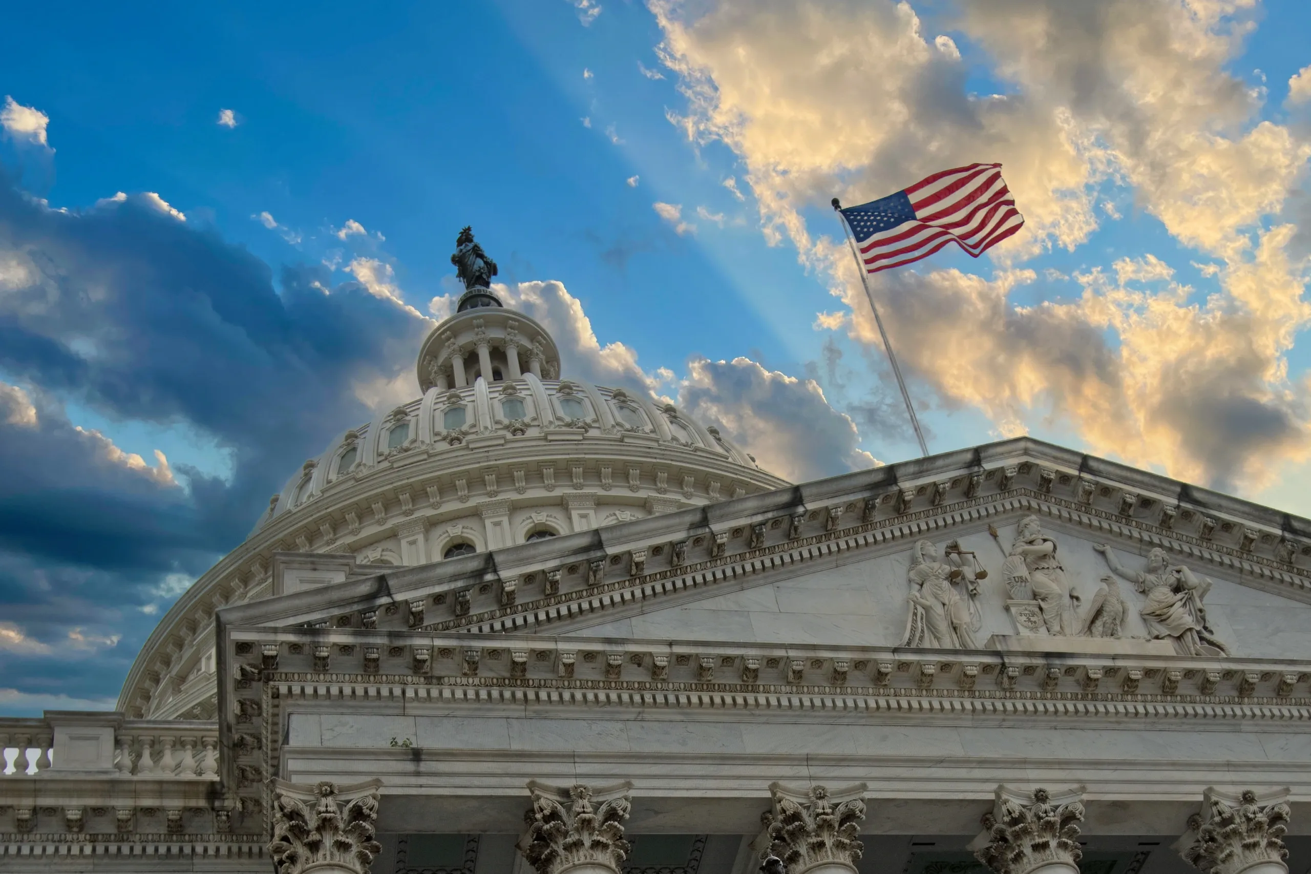 The U.S. Capitol building in Washington, D.C., photographed from outside in daylight, with the dome and congressional grounds visible