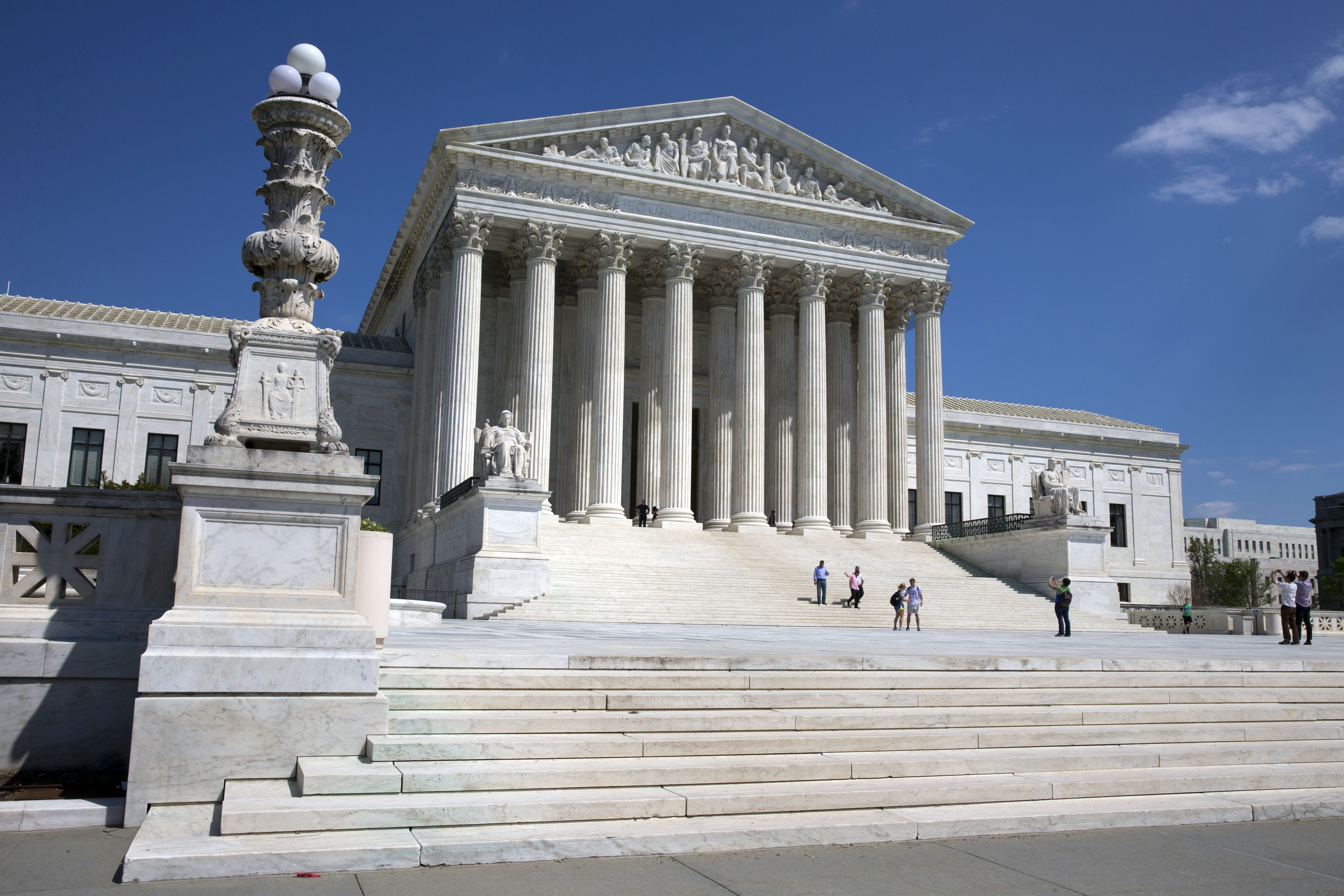 The U.S. Supreme Court building, photographed in daylight, relevant to the Court’s decision in West Virginia v. EPA