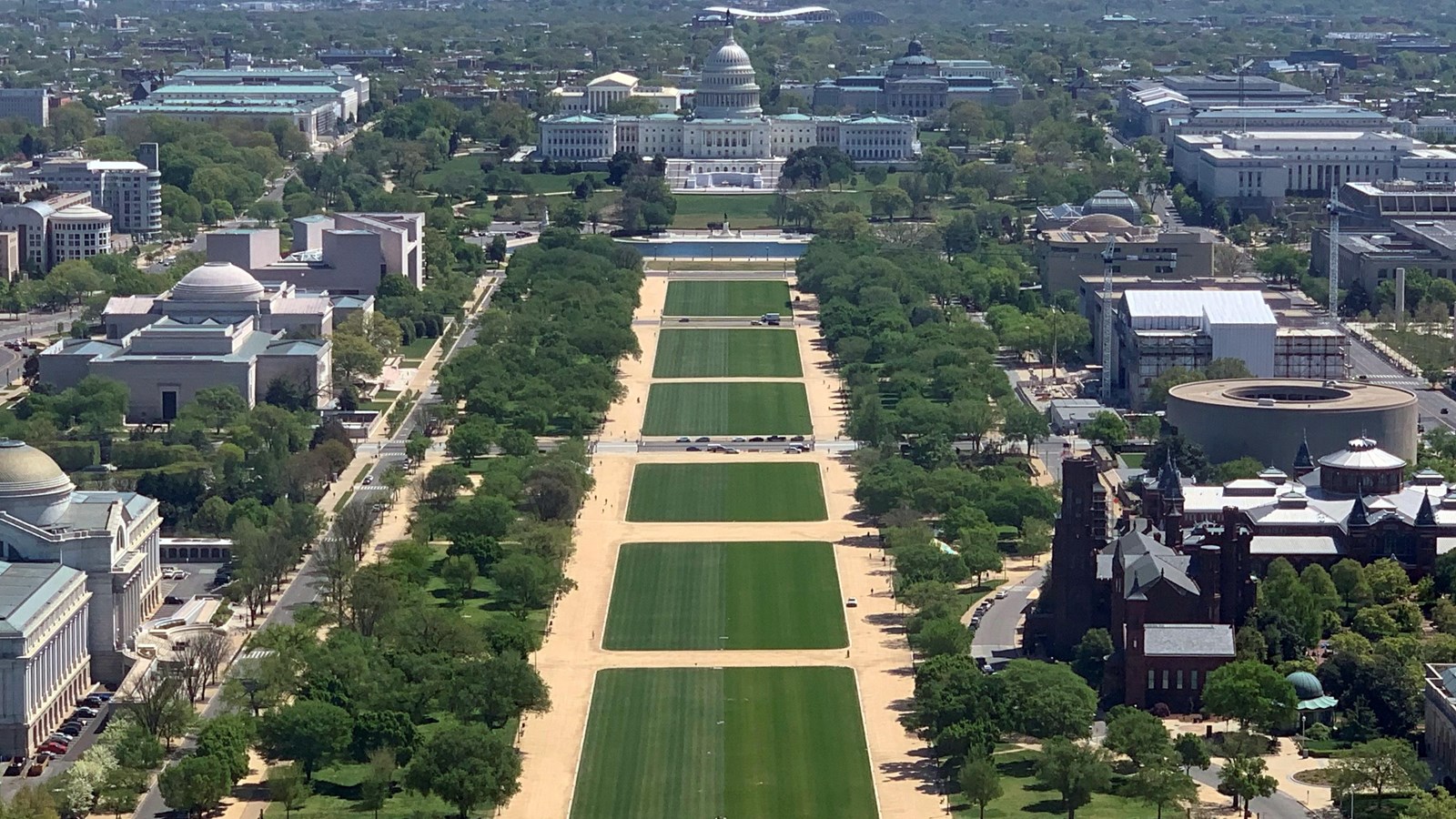 The United States Capitol building in Washington, DC, viewed from the National Mall on a clear day