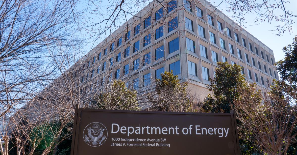The United States Department of Energy headquarters building in Washington, D.C., photographed from outside with clear signage visible, editorial news photography style
