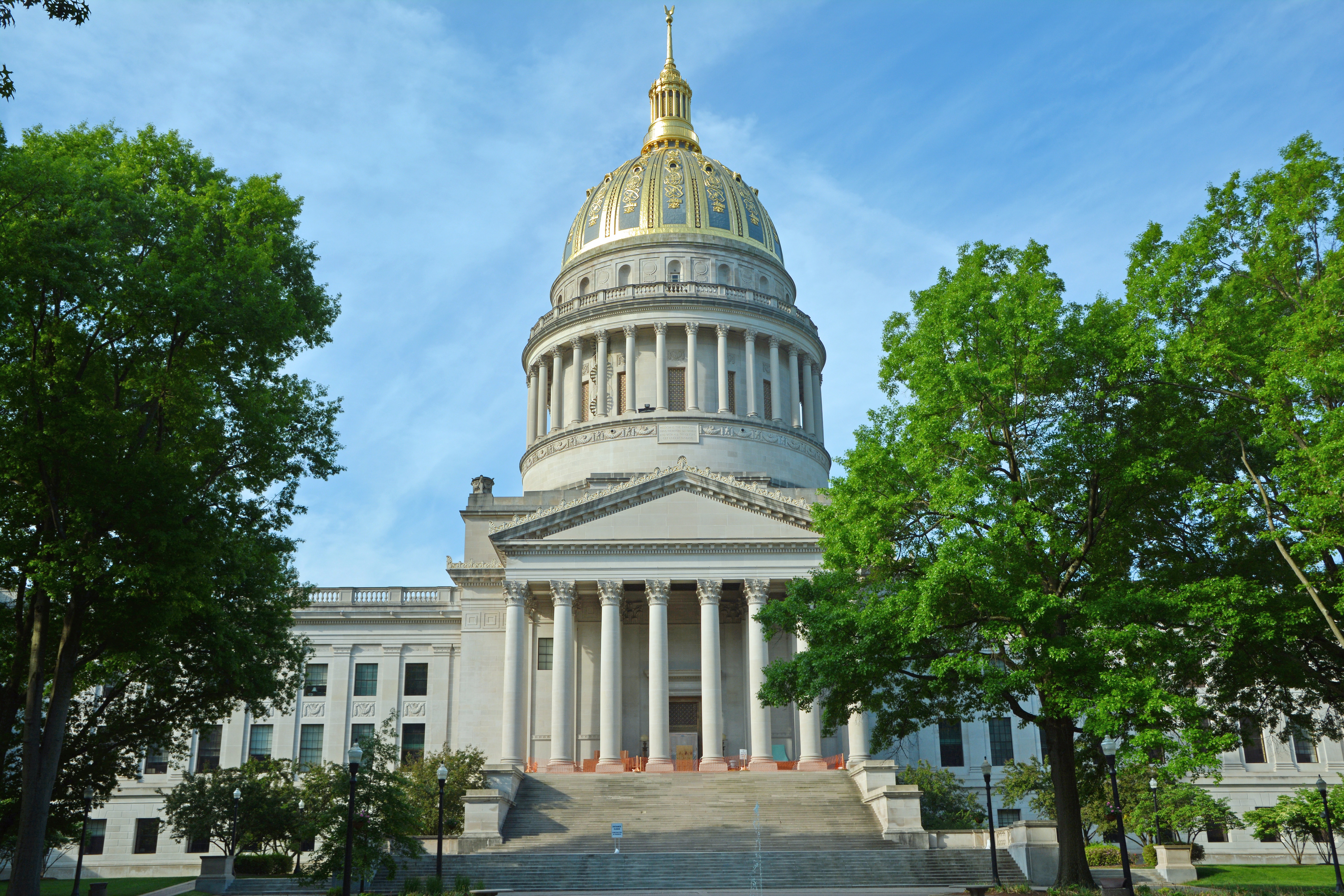 The West Virginia State Capitol building in Charleston, West Virginia, photographed from the grounds with the gold dome visible