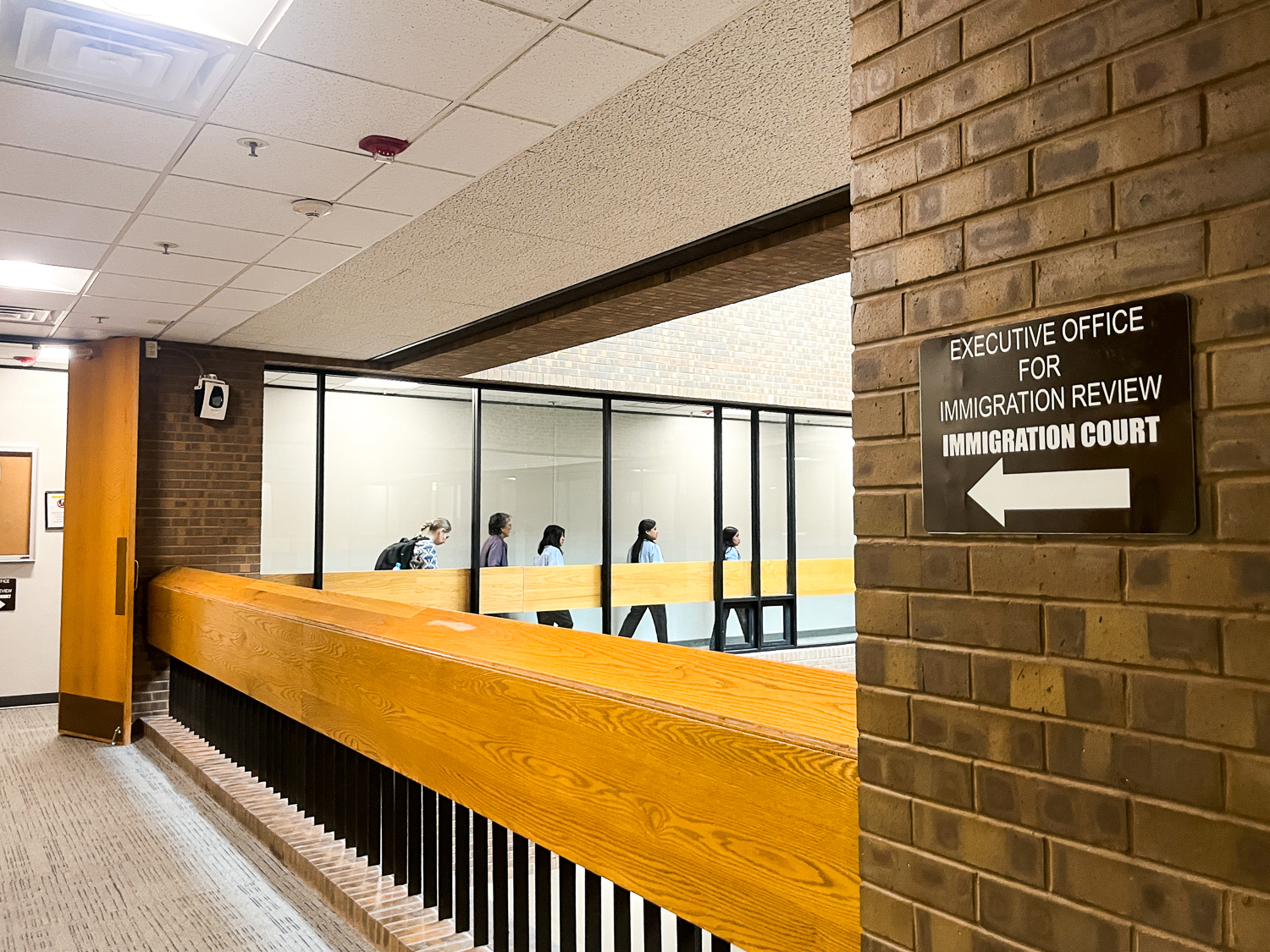 The entrance to the Executive Office for Immigration Review (EOIR) headquarters in Falls Church, Virginia, which houses the immigration courts within the Justice Department
