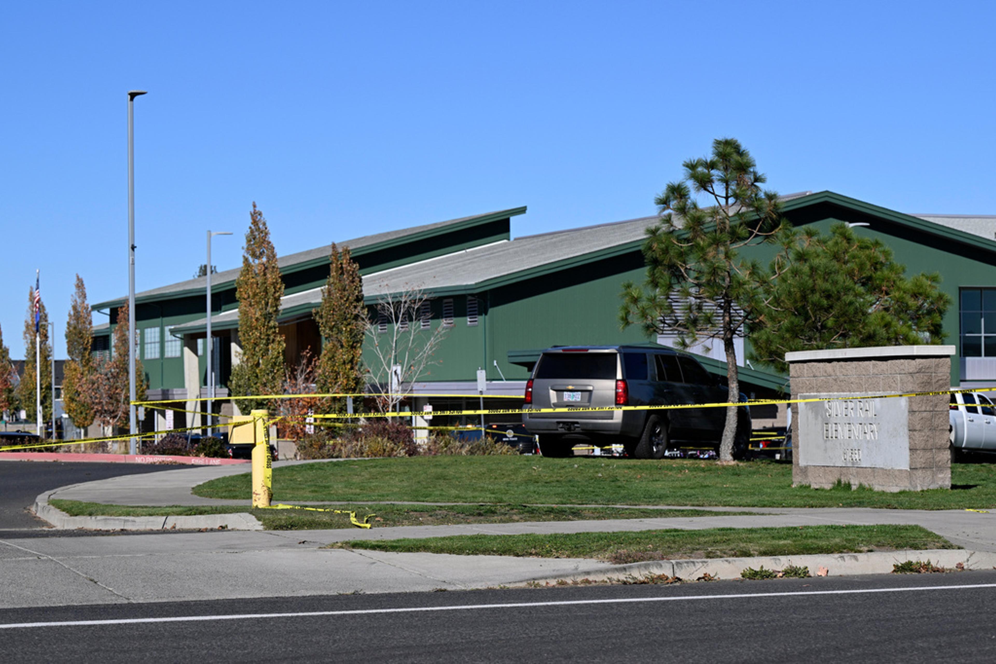 The exterior of Silver Rail Elementary School in Bend, Oregon, photographed from a public street in daylight