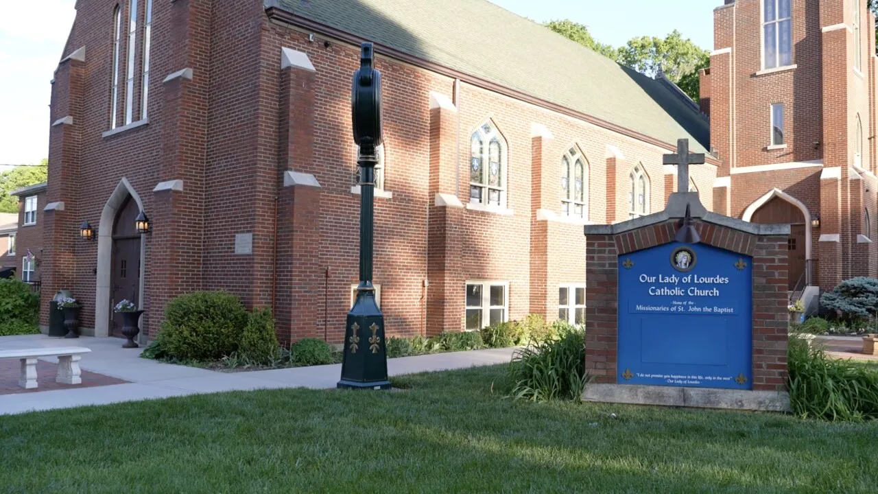 The exterior of St. John Church in Park Hills, Kentucky, photographed from the street in daylight
