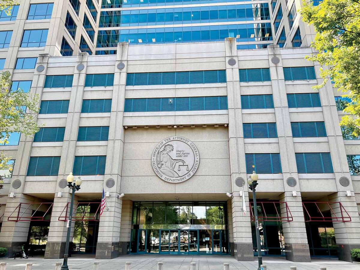 The exterior of a California Department of Justice or California Attorney General office building in Sacramento