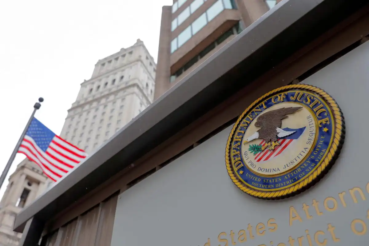 The exterior of a United States Attorney's Office building with official signage visible