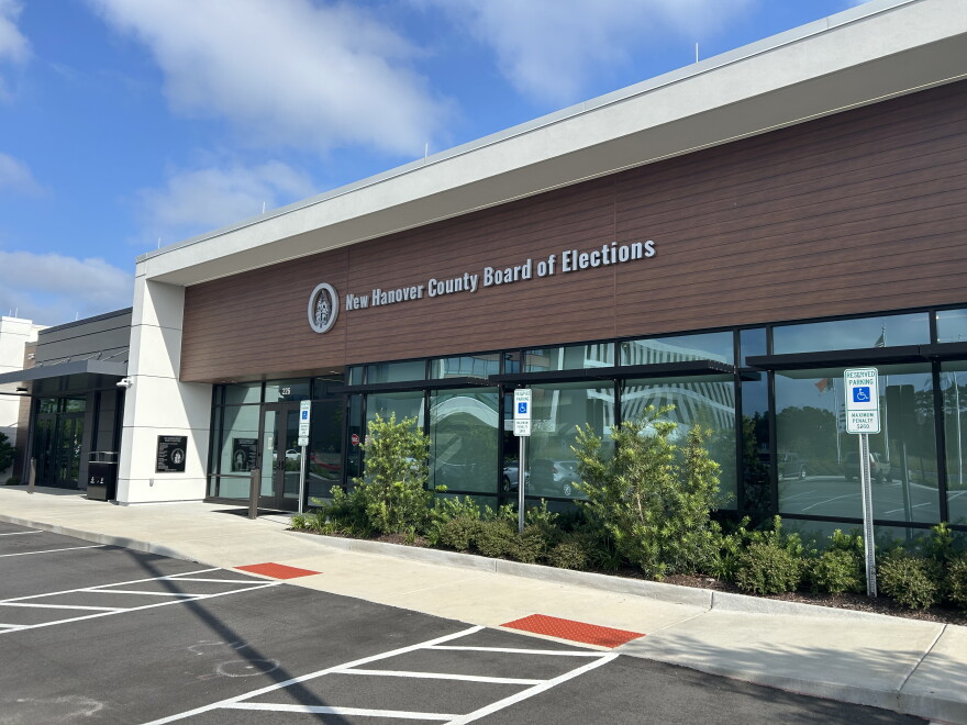 The exterior of a state board of elections or state election office building, representing the administrative work of maintaining voter registration databases