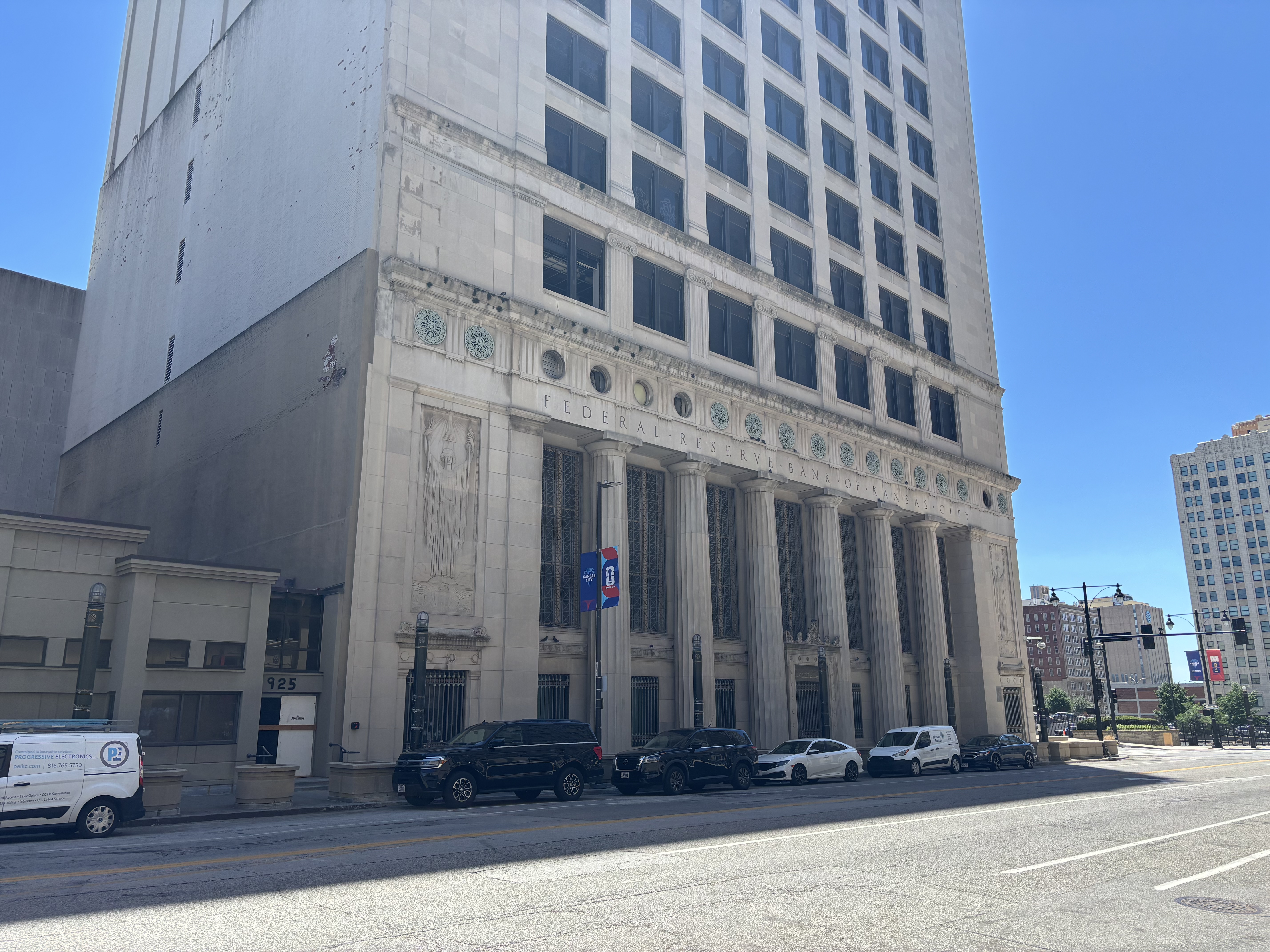 The exterior of the Federal Reserve Bank of Kansas City building, photographed from street level