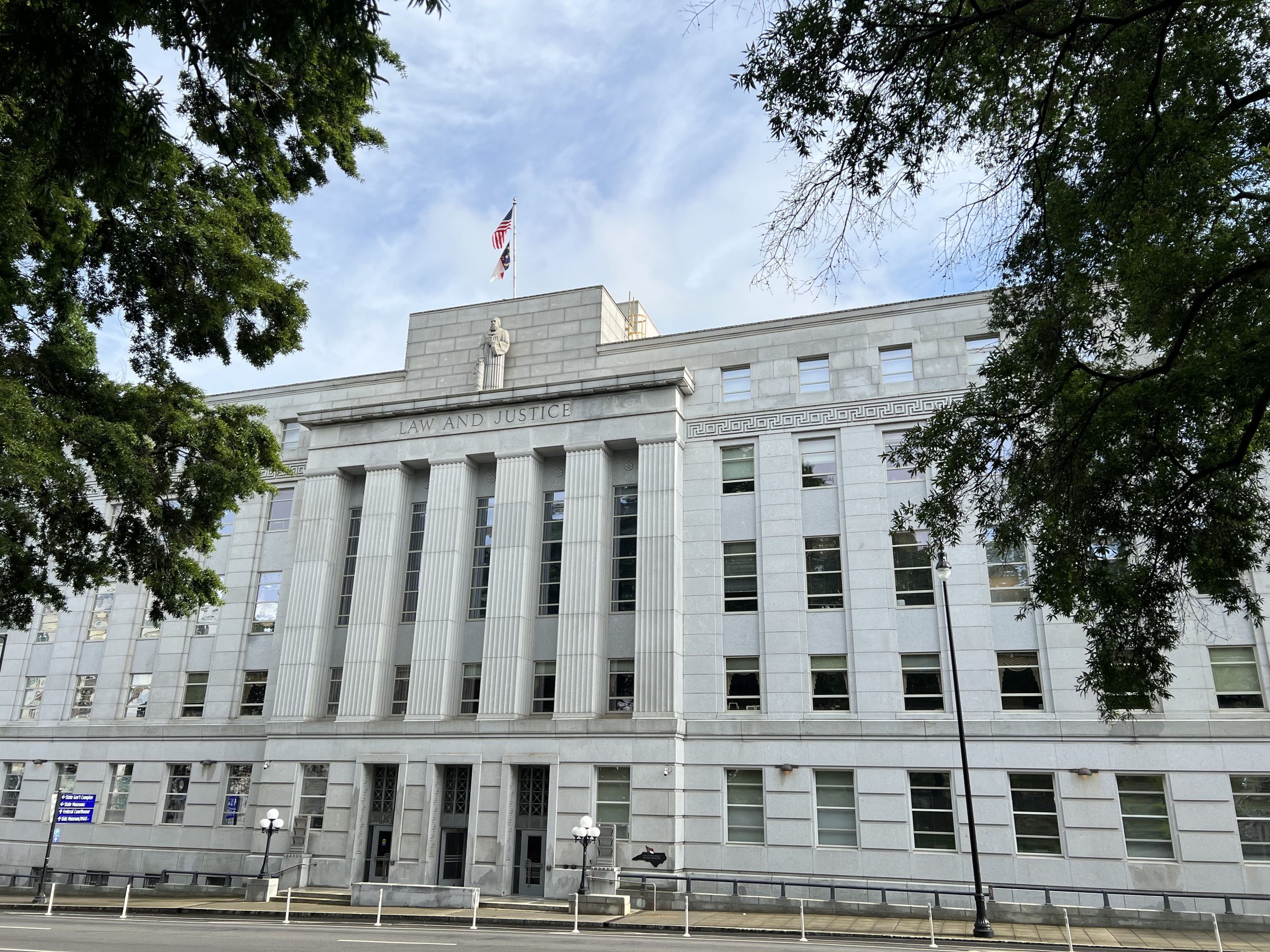 The exterior of the North Carolina Supreme Court building in Raleigh, North Carolina, photographed in daylight with the main entrance visible