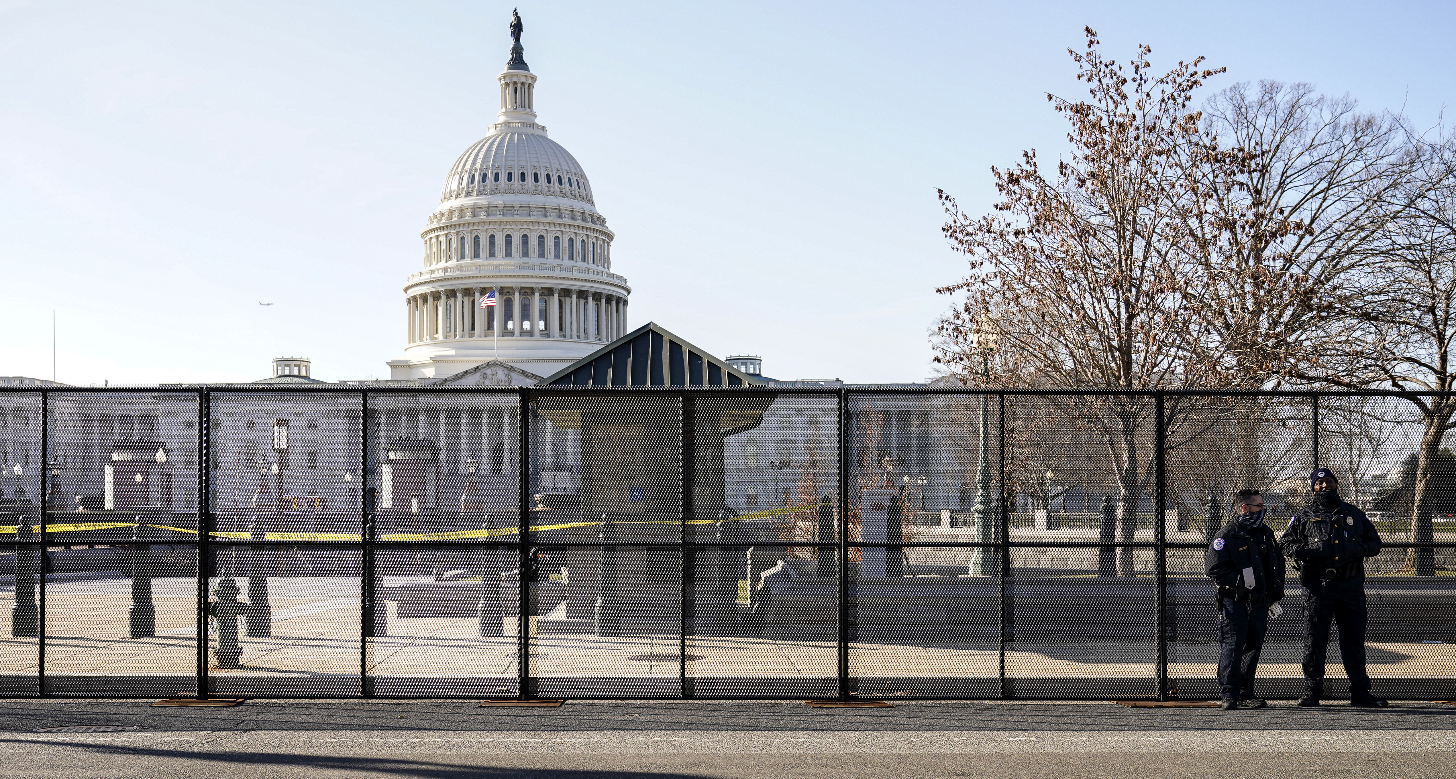 The exterior of the United States Capitol in Washington, D.C. on a clear winter day, with steps and columns visible and no prominent text