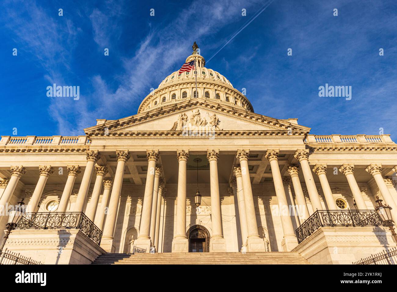 The exterior of the United States Capitol on the Senate side at daylight, with steps and columns visible in a single frame, real photograph style