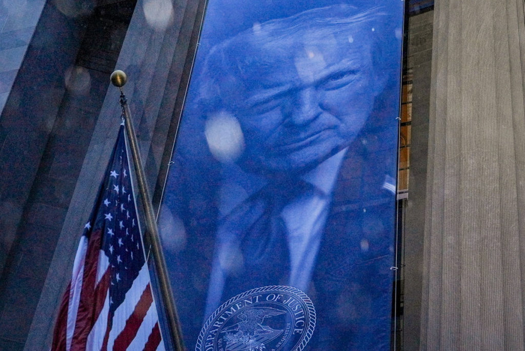 The exterior of the United States Department of Justice headquarters in Washington, DC, viewed from street level in daylight, news photography style