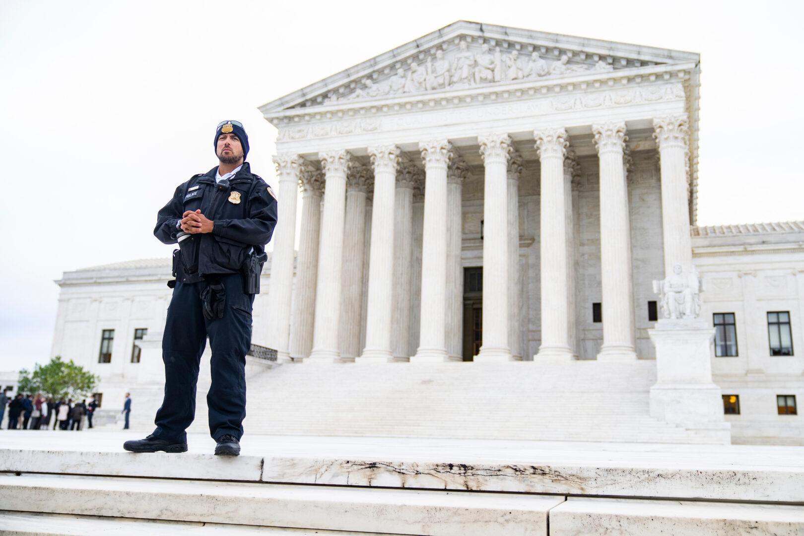 The exterior of the United States Supreme Court building in Washington, DC, photographed in daylight with the front steps and columns visible