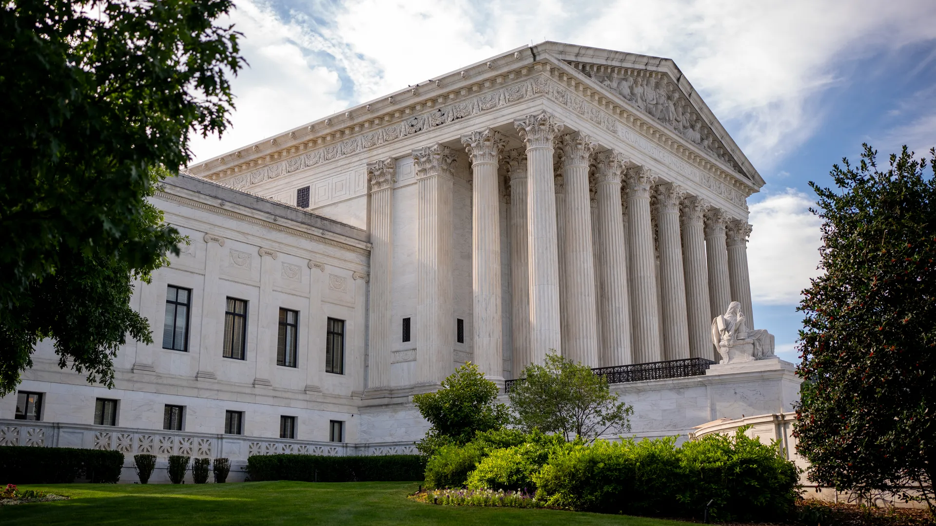 The exterior of the United States Supreme Court building in Washington, D.C., showing the columns and front steps.
