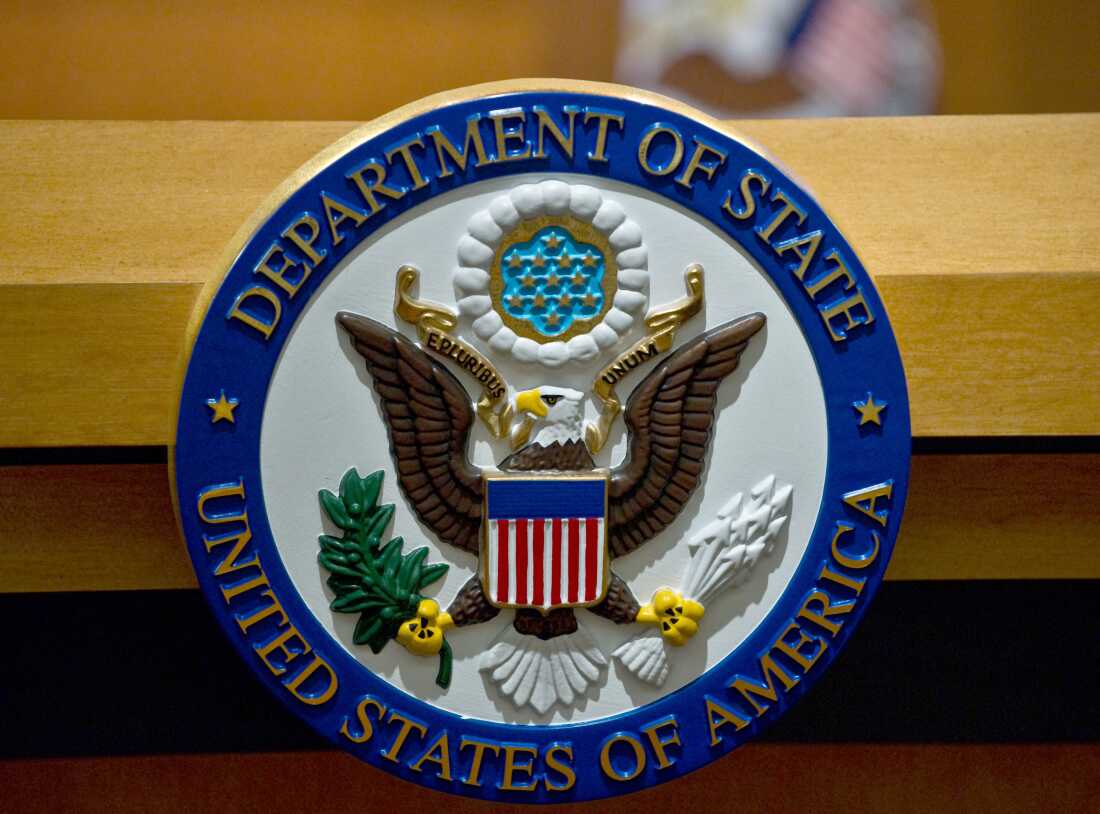 The seal of the U.S. Department of State displayed inside a government building