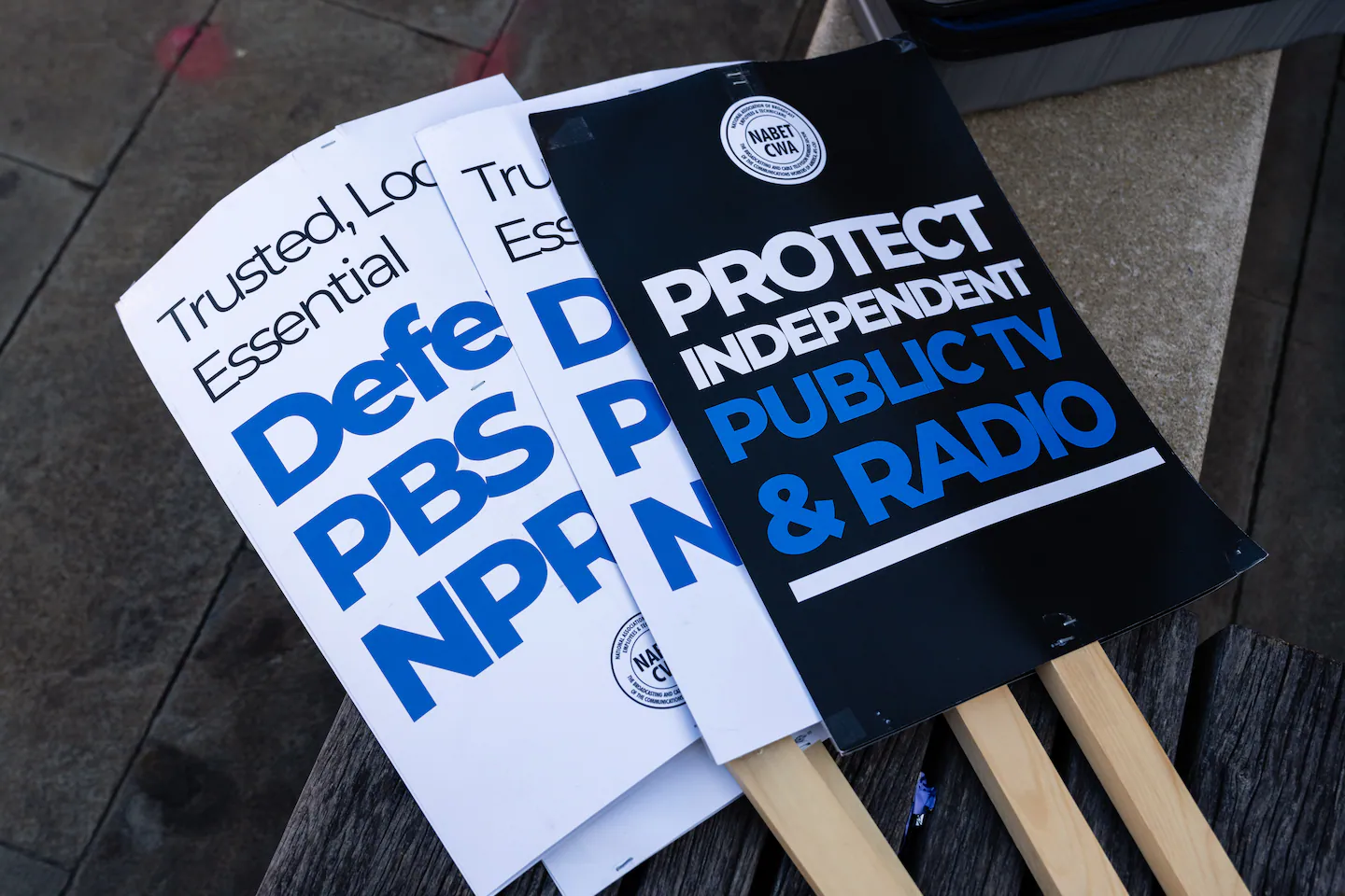 The sign outside NPR headquarters in Washington, D.C., photographed in daylight from the sidewalk