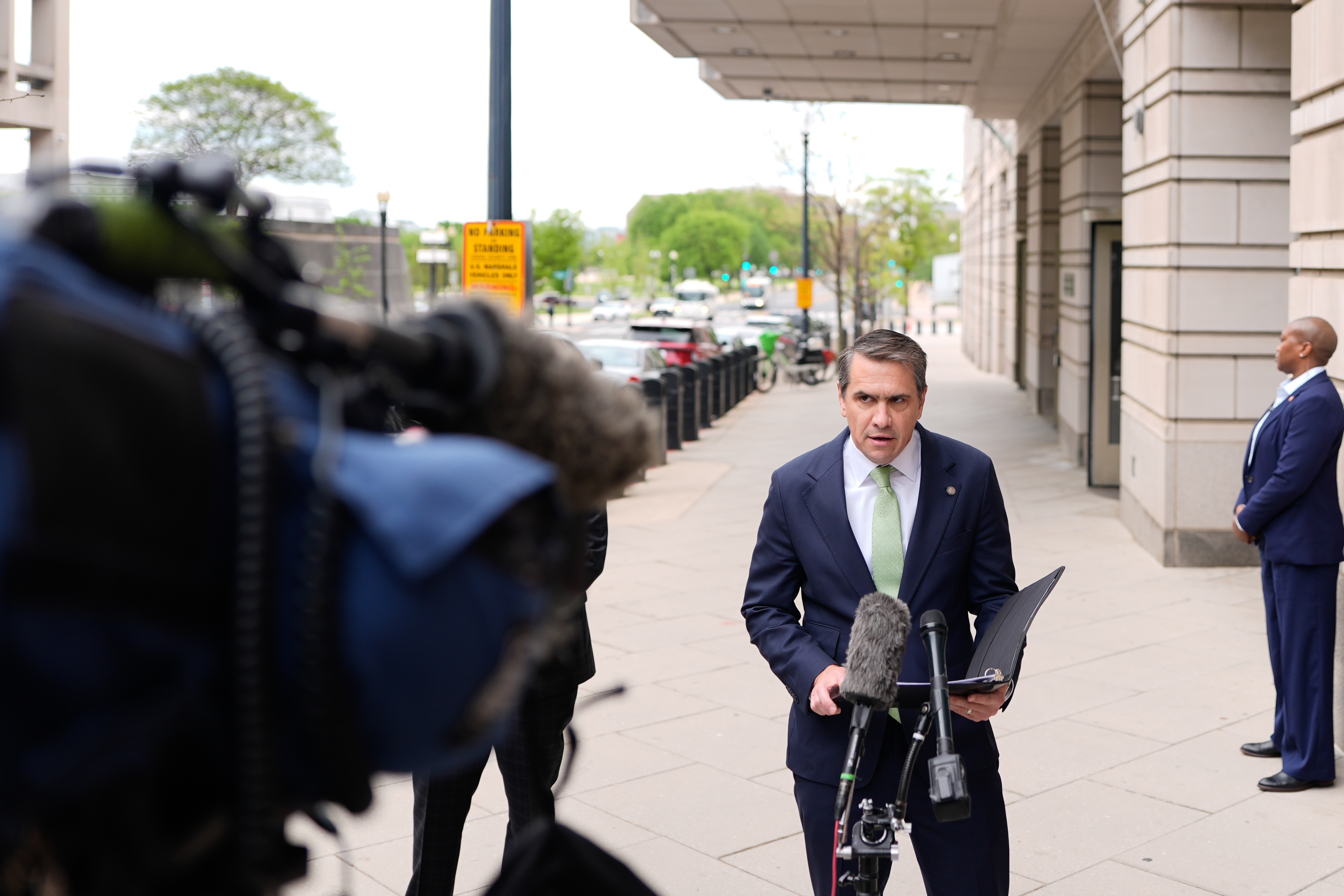 Todd Blanche speaking to reporters outside a courthouse during a public appearance