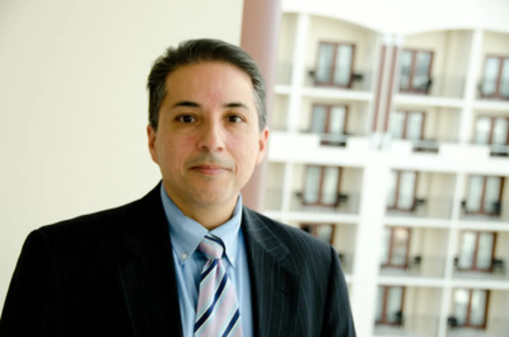 U.S. District Judge Fernando Rodriguez Jr. in an official portrait or at a public courthouse event