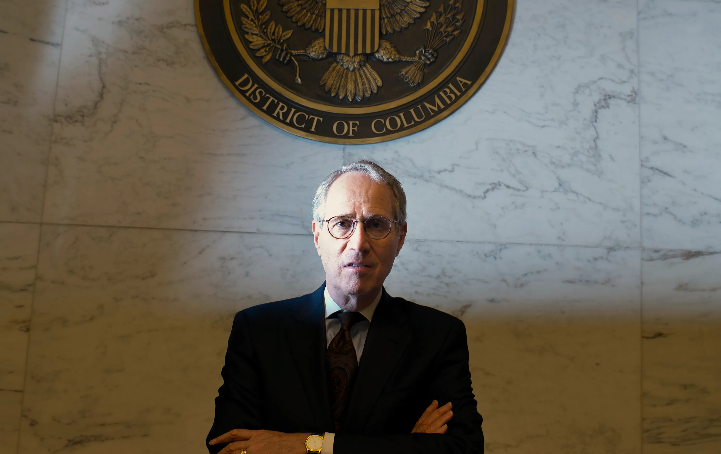 U.S. District Judge Paul L. Friedman during a public appearance or official portrait-style photograph, suitable for a news context