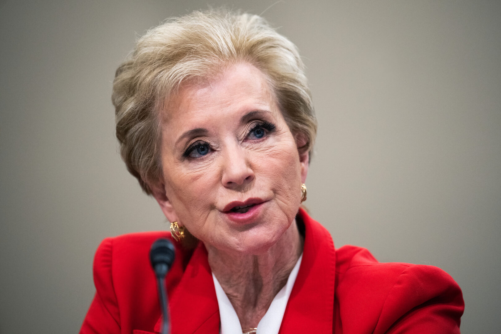 U.S. Education Secretary Linda McMahon speaking at a lectern during a public appearance