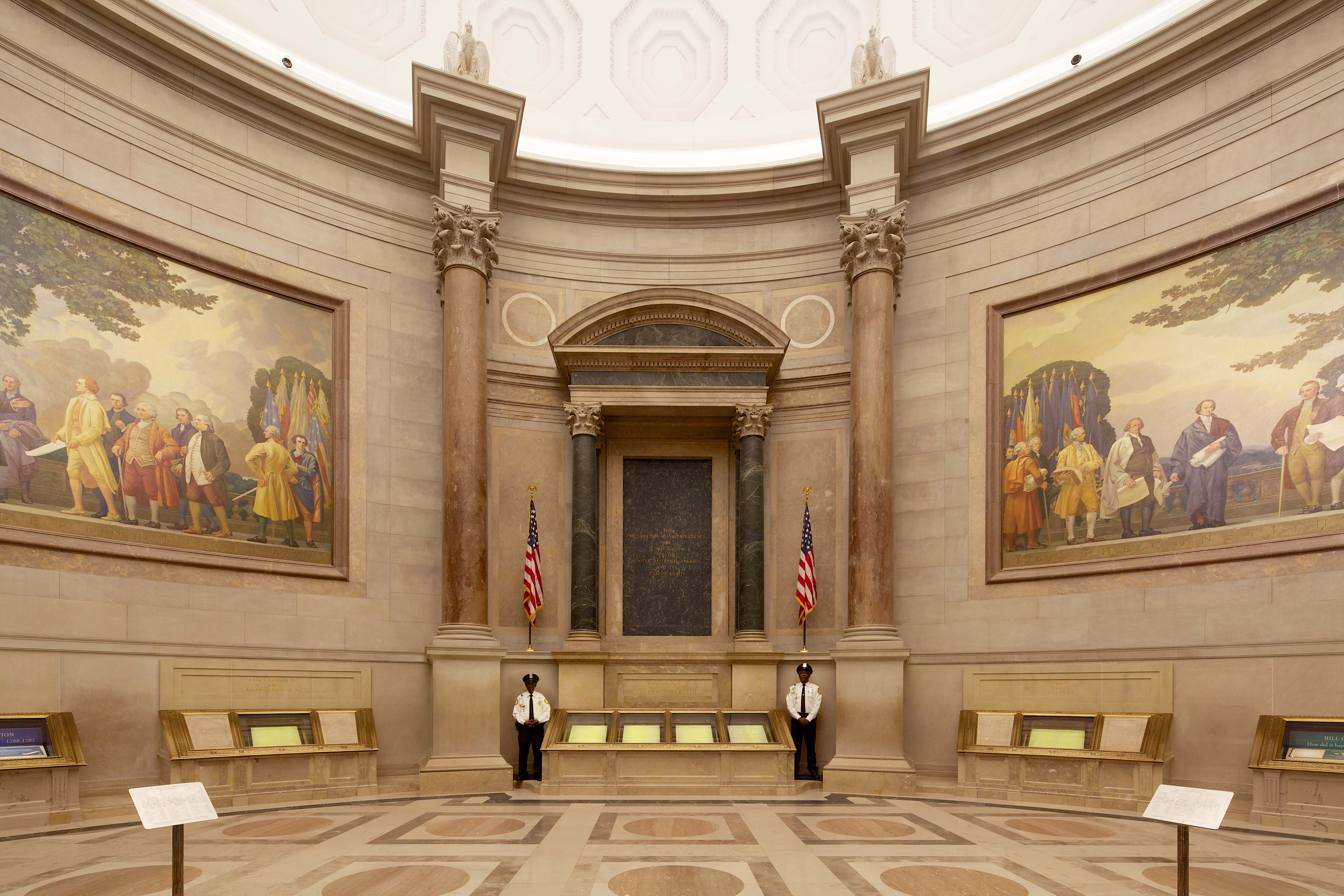 Visitors viewing the U.S. Constitution on display at the National Archives Rotunda in Washington, D.C.