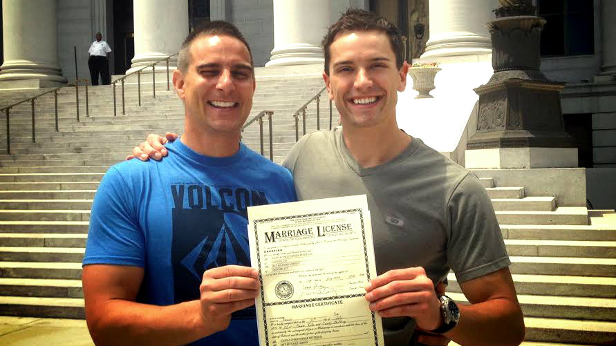 a same-sex couple with a marriage license
