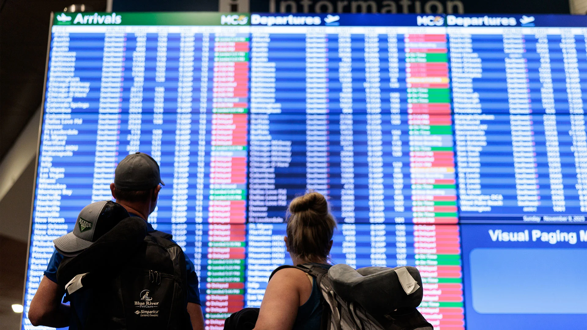 airport departure board delays cancellations