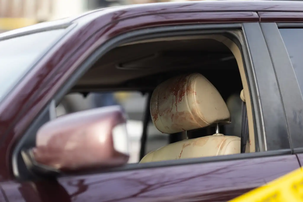 Blood is seen on the headrest of a vehicle where a federal agent shot a driver in South Minneapolis on Wednesday.Ben Hovland | MPR News