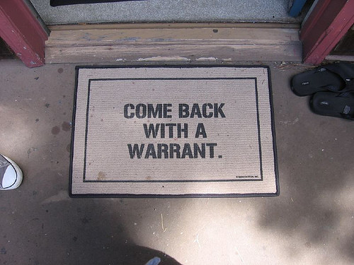 come back with a warrant door mat