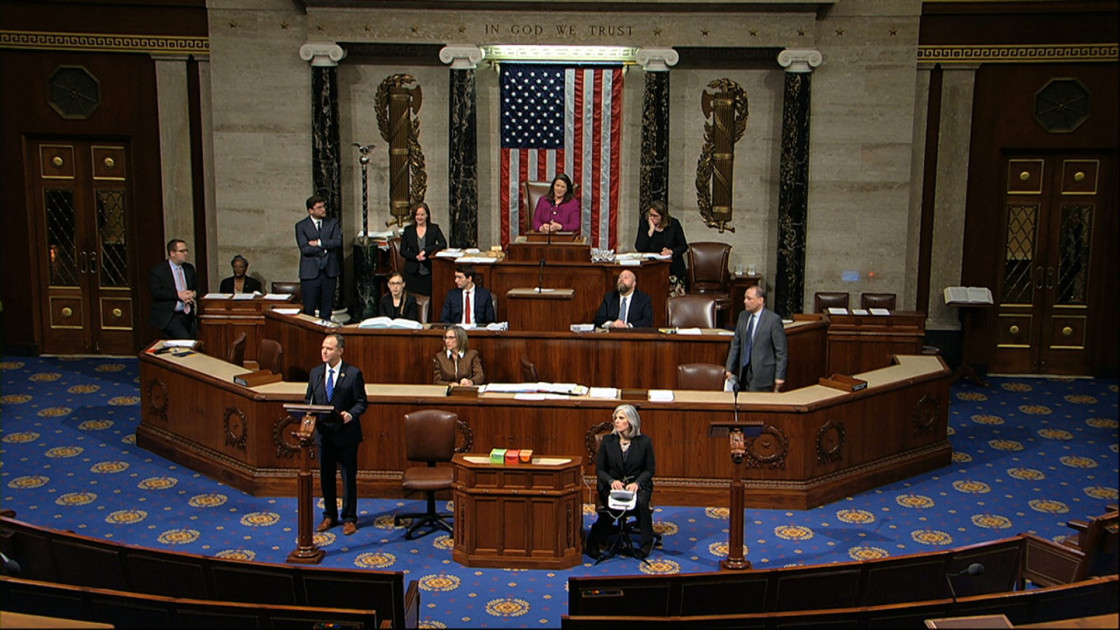 Congress members debating in chamber