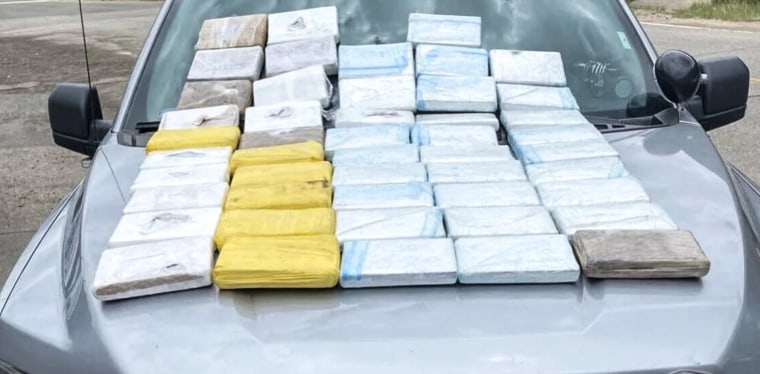 DEA agents with seized fentanyl packages
