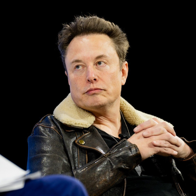 elon musk looking thoughtful