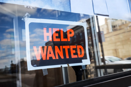 help wanted sign in a business window