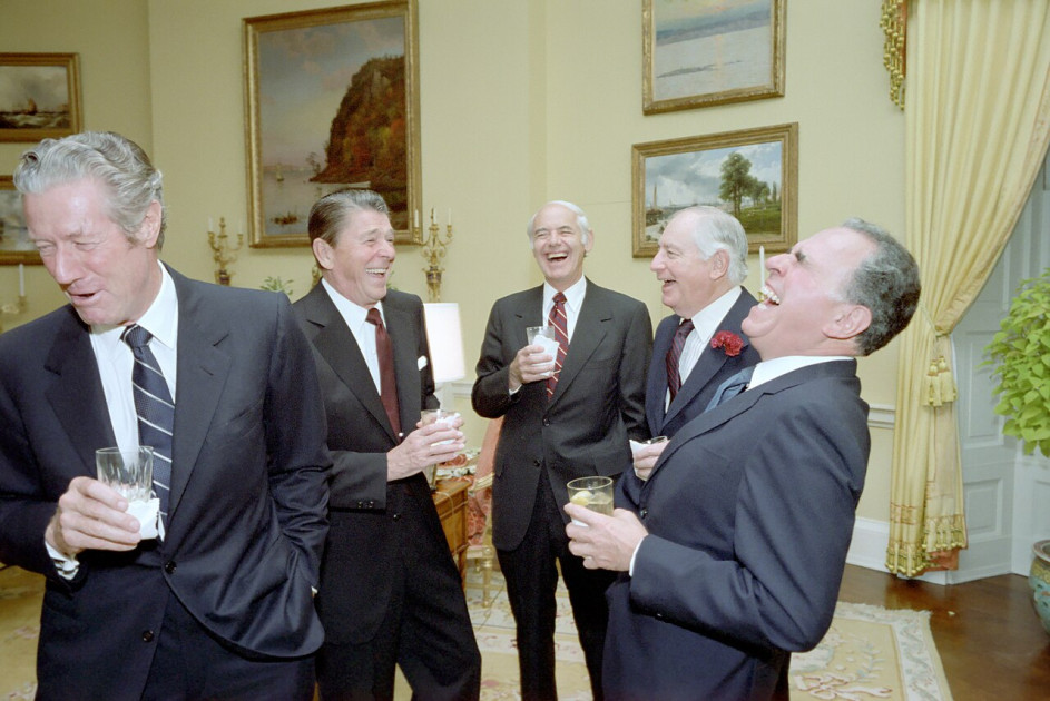 historical photo of Ronald Reagan and Tip O'Neill sharing a laugh