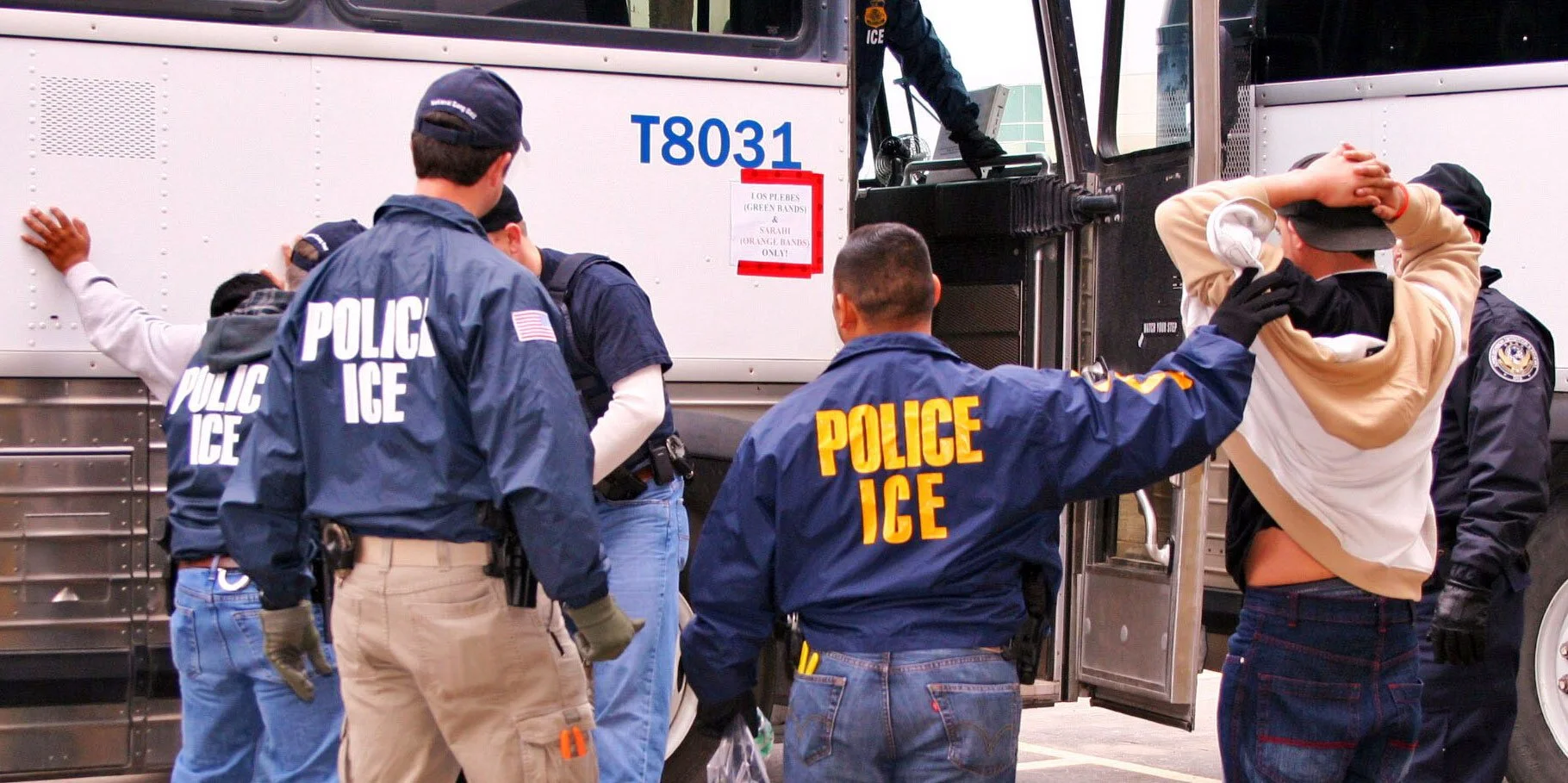 ICE agents conducting an arrest
