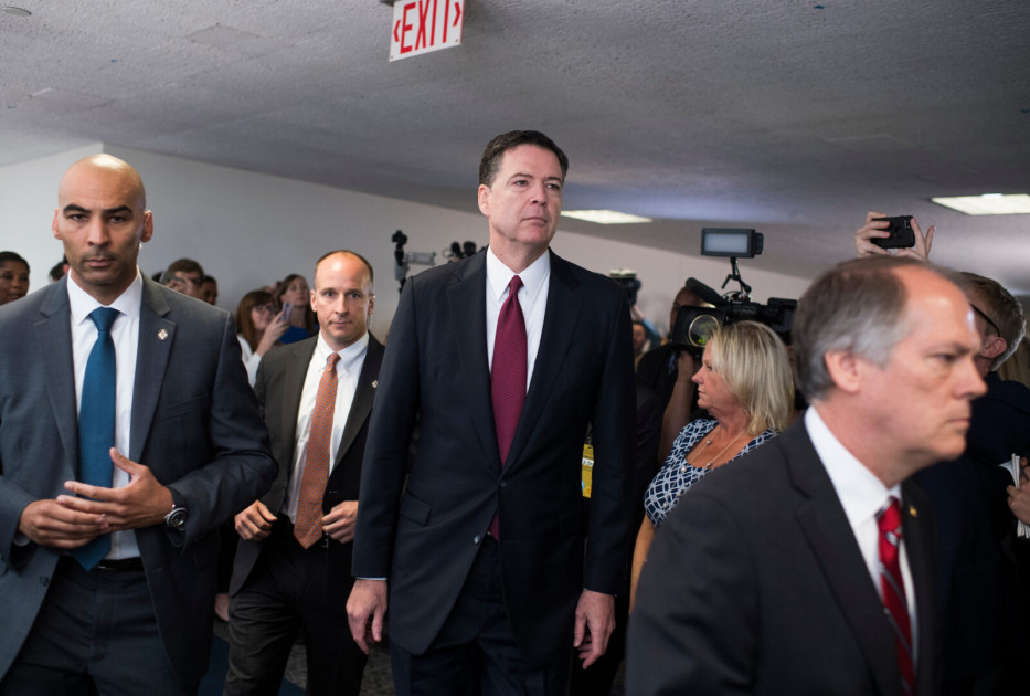James Comey leaving federal court