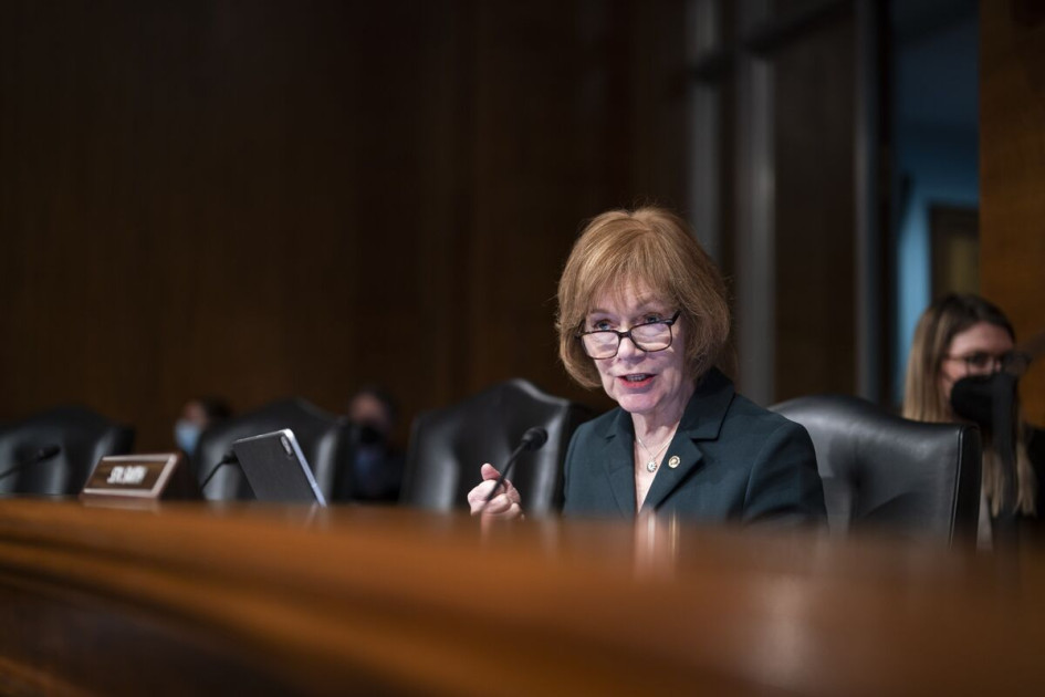 Minnesota Governor Tim Walz at press conference with Senator Tina Smith