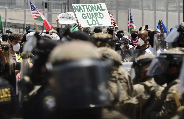 'national guard lol' sign at la protests