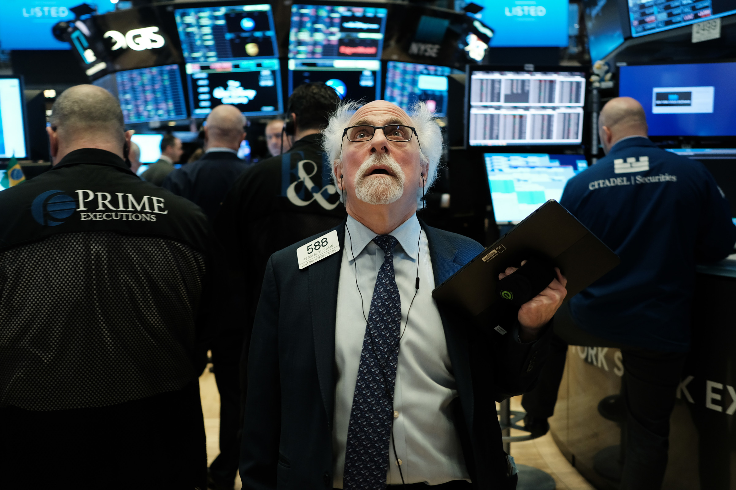 New York Stock Exchange trading floor with worried traders