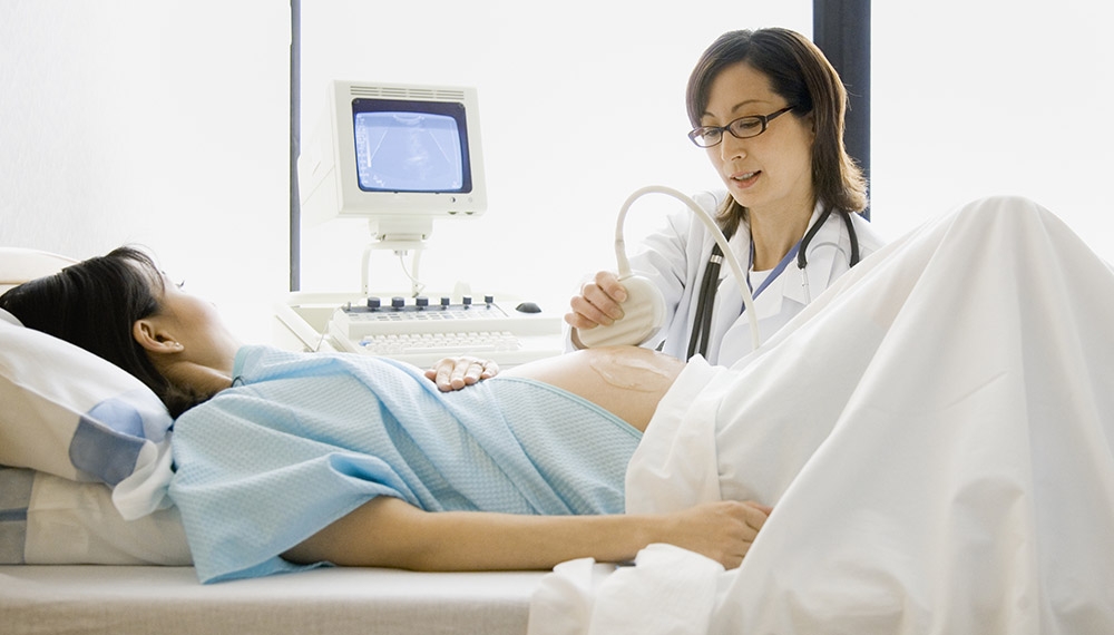pregnant woman at prenatal care appointment