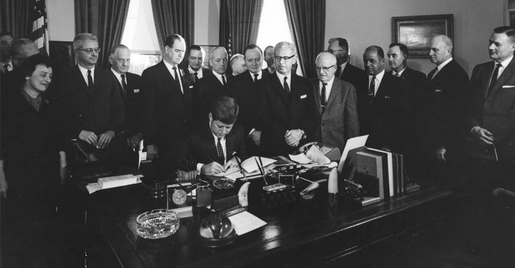 President Kennedy signing executive order