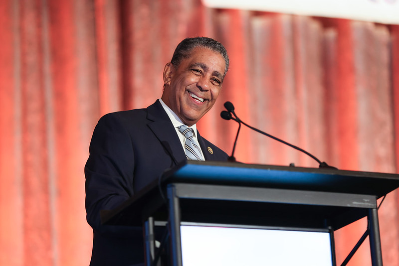 Rep. Adriano Espaillat speaking at a podium