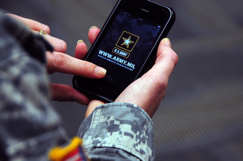 smartphone photographing military personnel