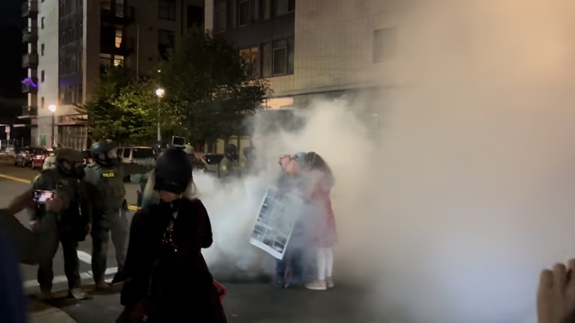 tear gas cloud outside ICE facility Portland
