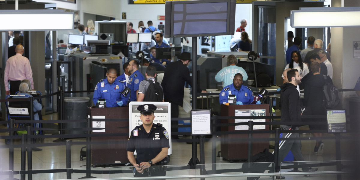 TSA security checkpoint airport officer
