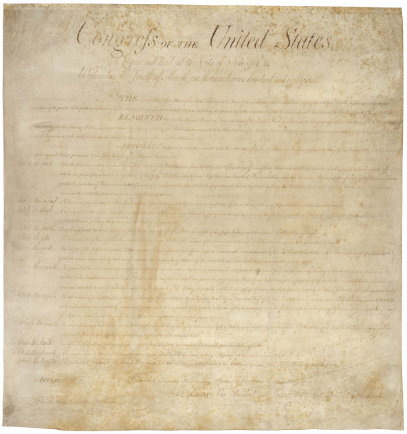 U.S. Constitution document with First Amendment highlighted