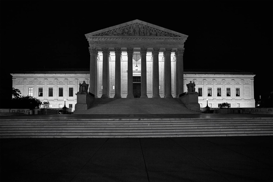 U.S. Supreme Court building at night 2025