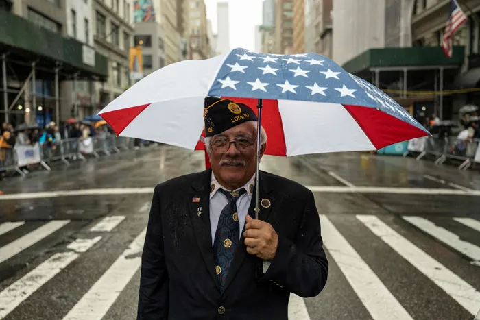 veteran under us flag umbrella