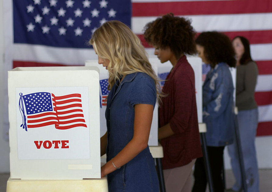 Voters casting ballots at a polling station
