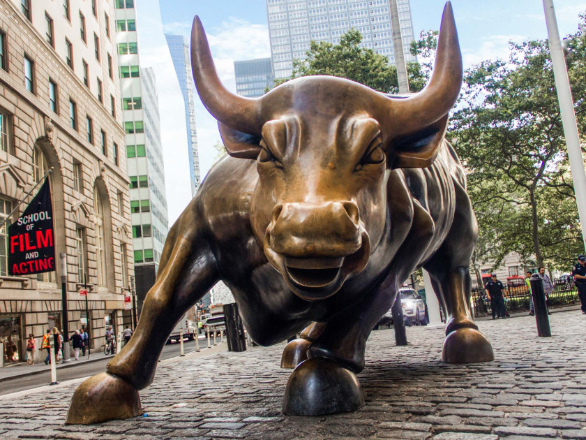 Wall Street bull statue with congressional hearing gavel